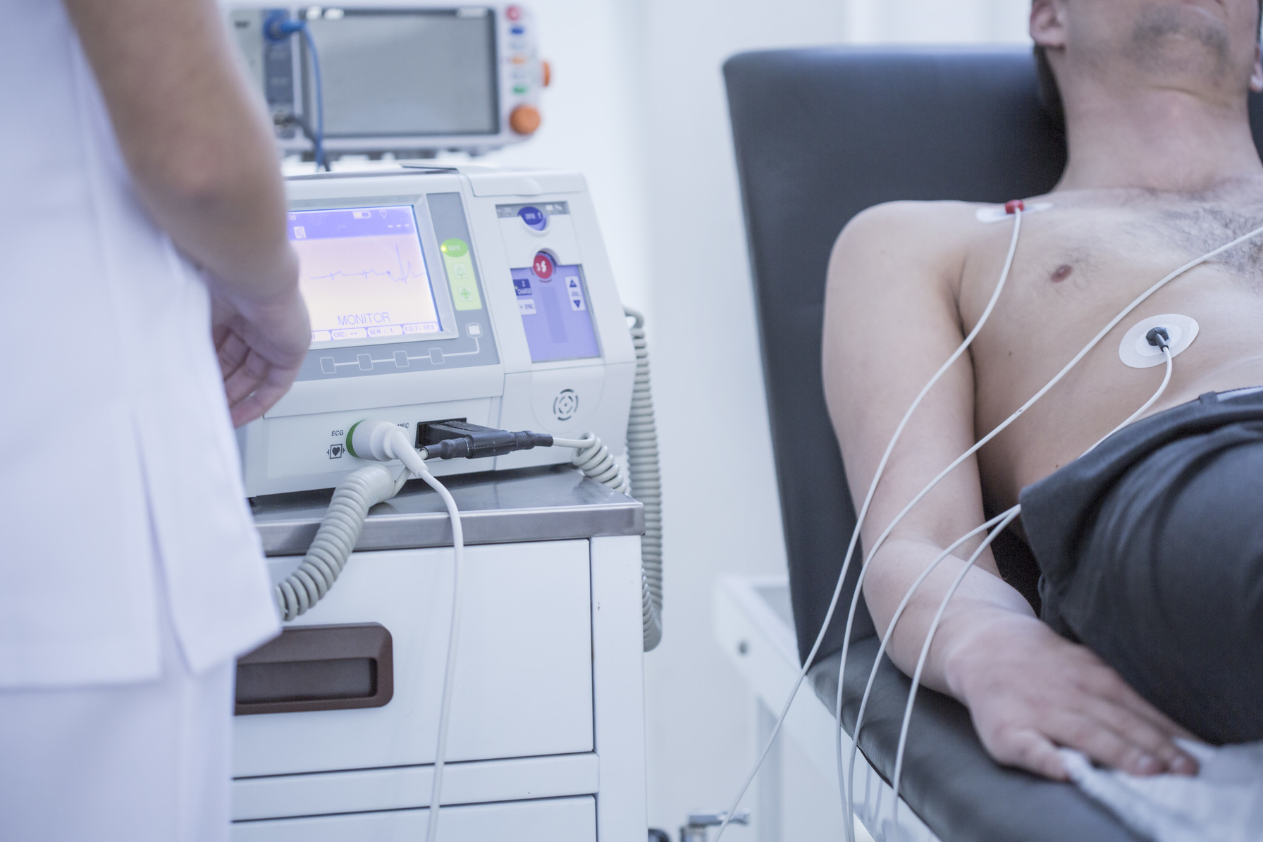 Young man in hospital getting heart rate monitored